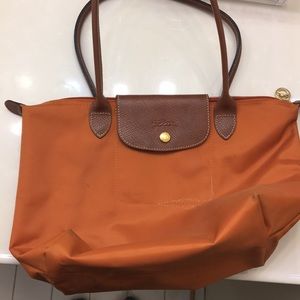 Orange longchamp bag